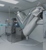 pharmaceutical-factory-man-worker-protective-clothing-working-with-control-panel-sterile-working-conditions 1