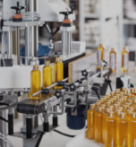 transparent-plastic-bottles-filled-with-yellow-substance 1